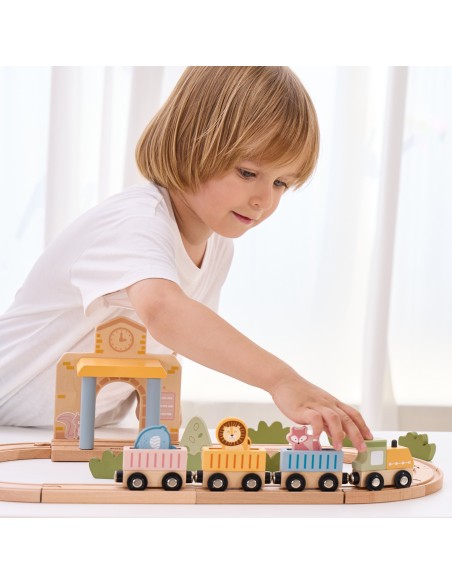 Deux enfants jouant avec le circuit de train PolarB