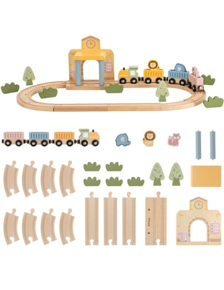 Enfant avec les wagons et figurines animaux du circuit